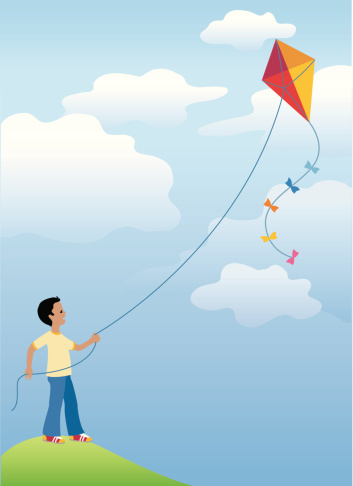 Boy flying kite