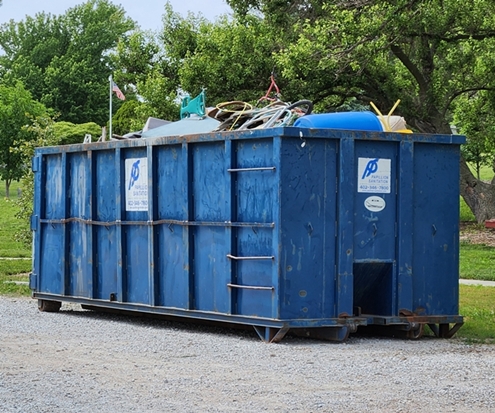 Dumpster full of trash 495