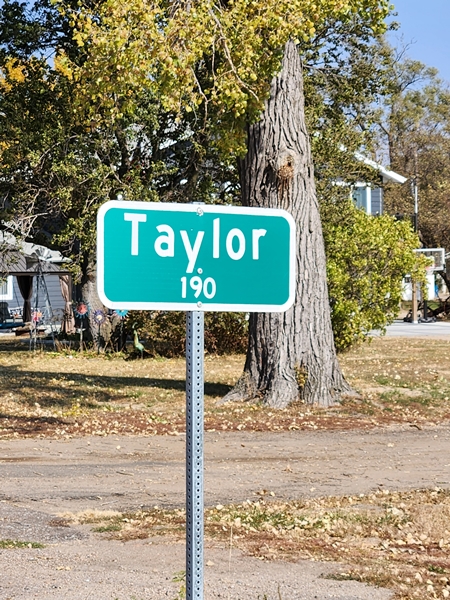 Taylor population sign 450